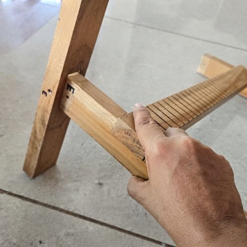 Standing wooden handloom with weaving threads and shuttle for kids creative learning
