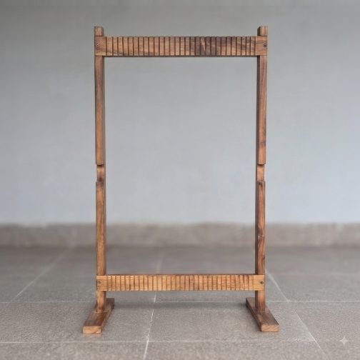 Standing wooden handloom with weaving threads and shuttle for kids creative learning