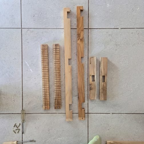 Standing wooden handloom with weaving threads and shuttle for kids creative learning